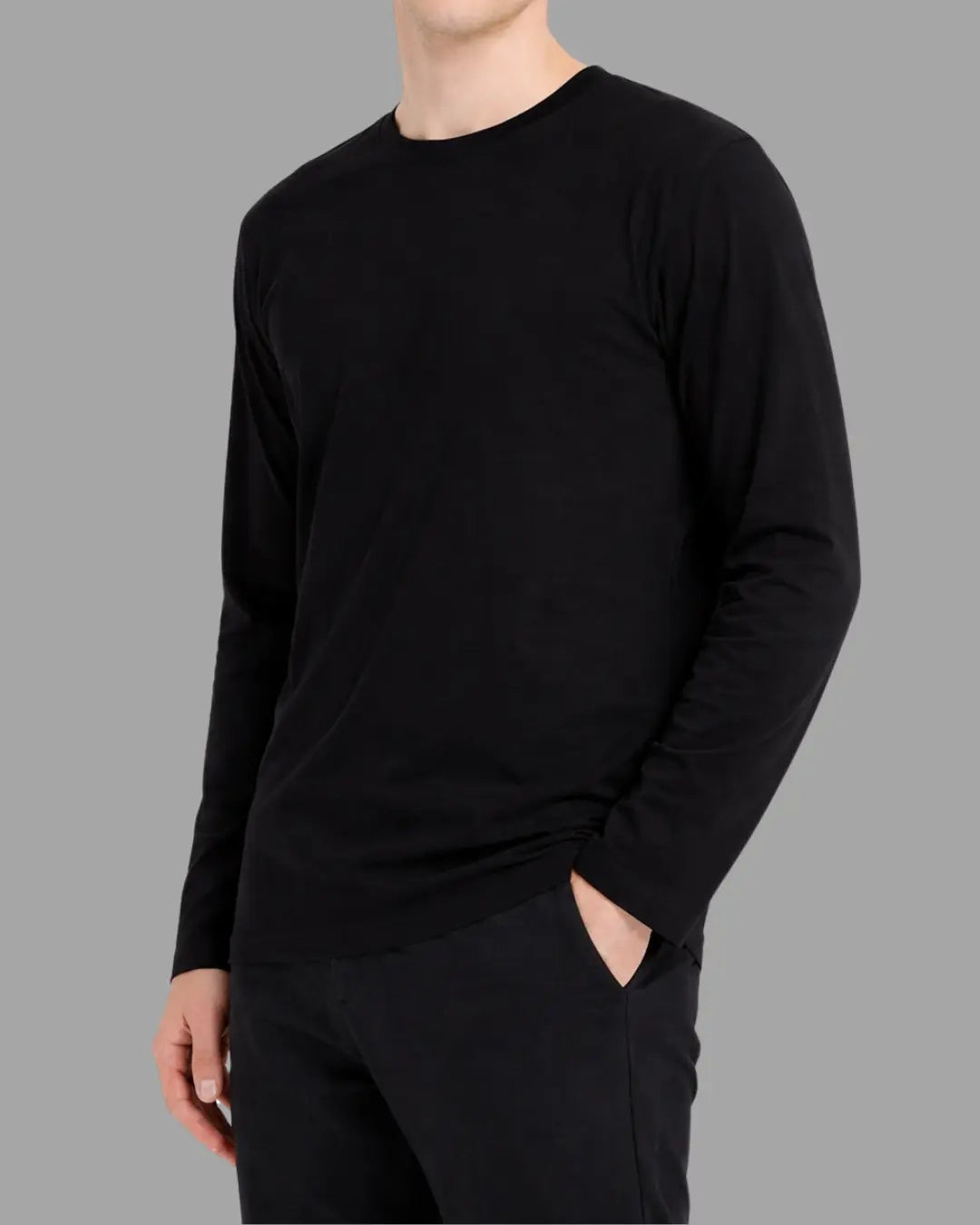 man wearing black long sleeve t-shirt with heavyweight and 100% cotton fabric, tailored fit